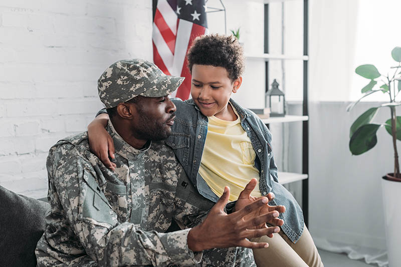 a veteran talking with his son
